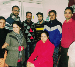 Nascenture employees posing for a group photo inside the office, showcasing a strong team bond.